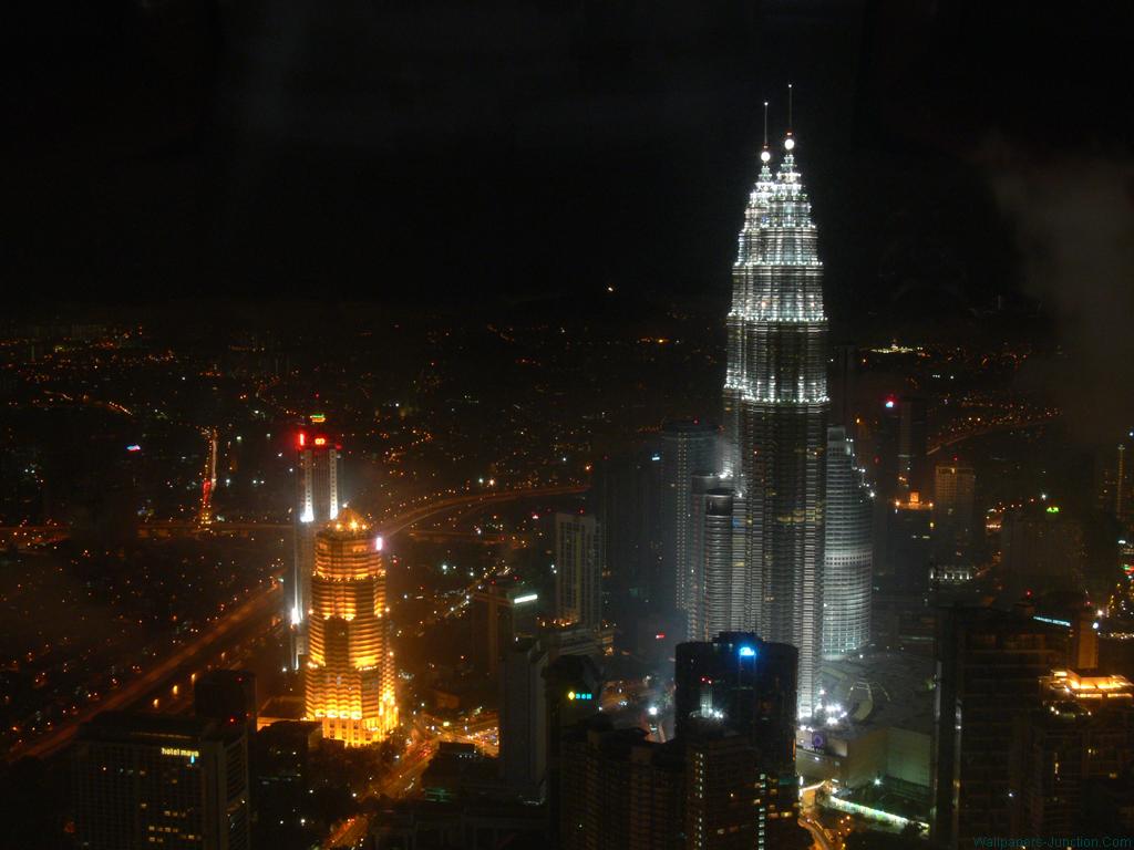 The Petronas Towers Malay Menara Also Known As