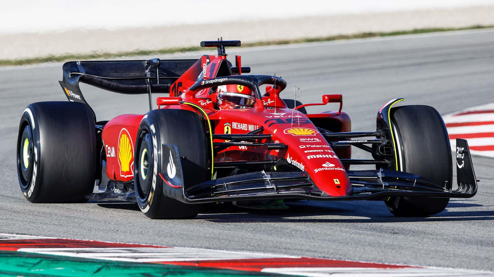 Ferrari F1 Car Driving On A Track Wallpaper