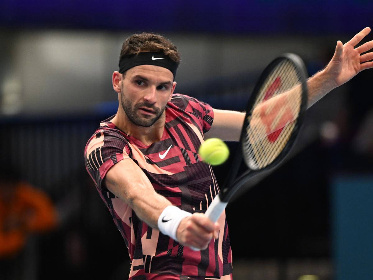 Grigor Dimitrov Receiving Tennis Ball Wallpaper