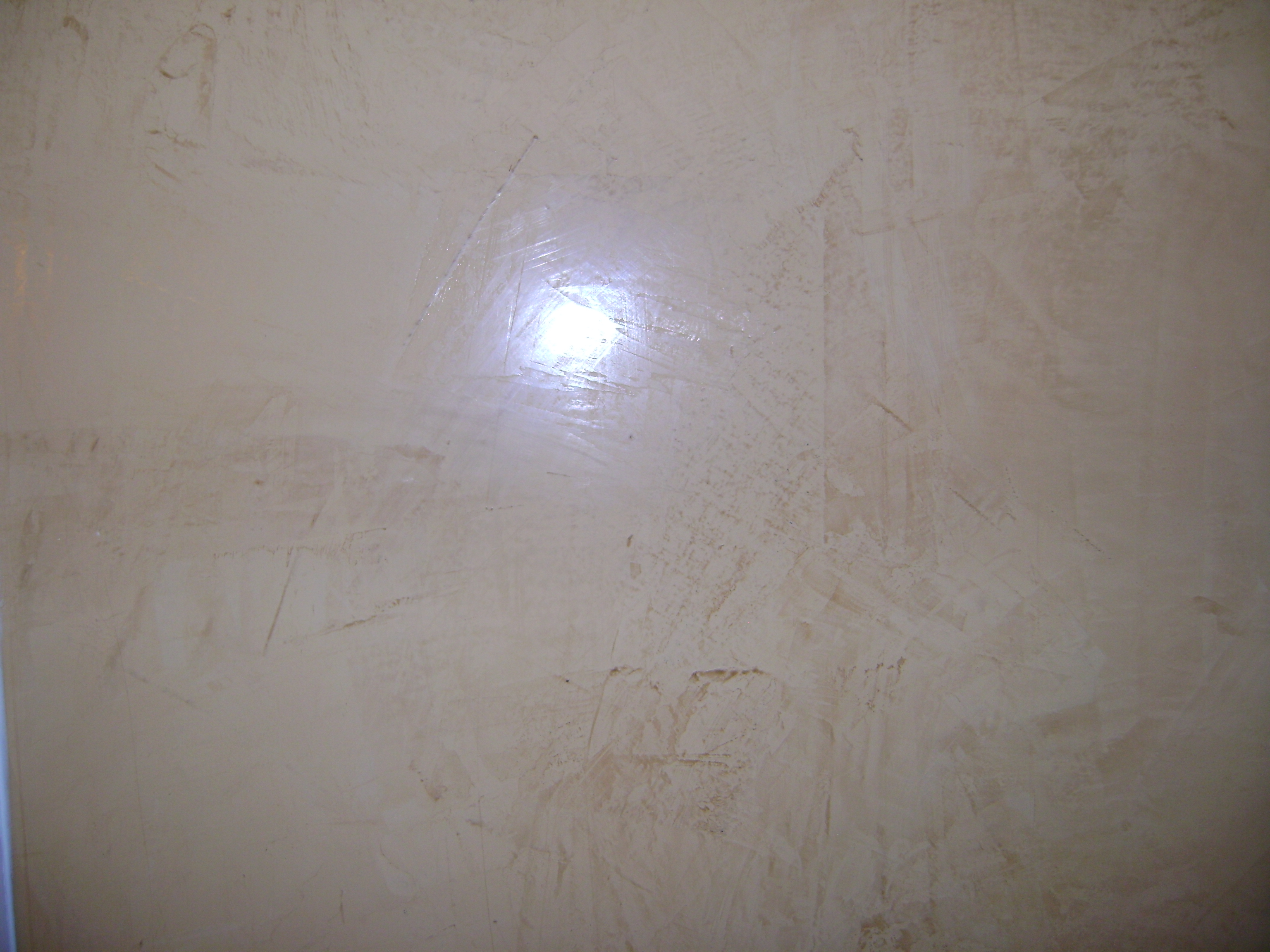 Finished appearance of Venetian Plaster over wallpaper