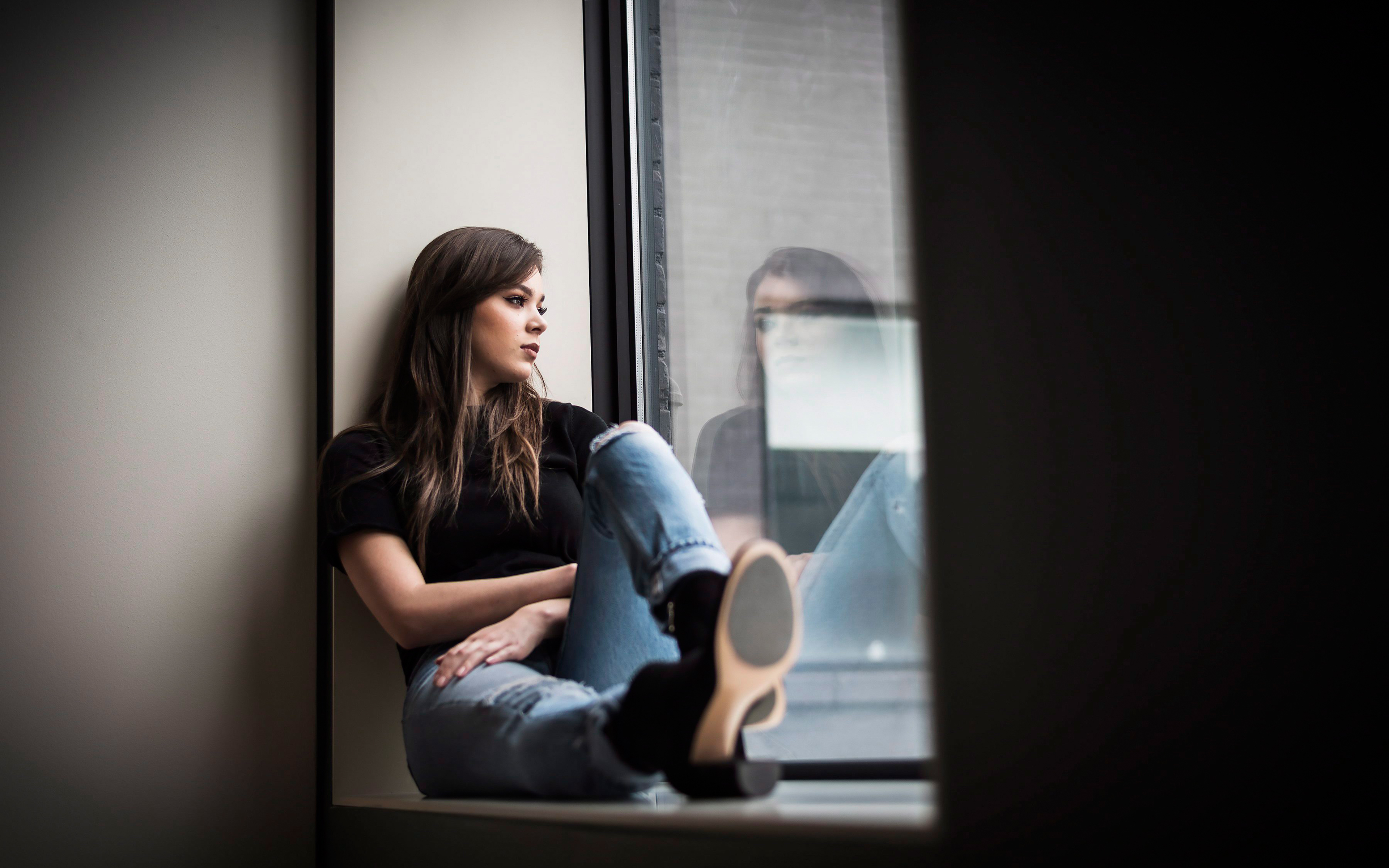 Hailee Steinfeld Sitting Near Window In Black Wallpaper HD