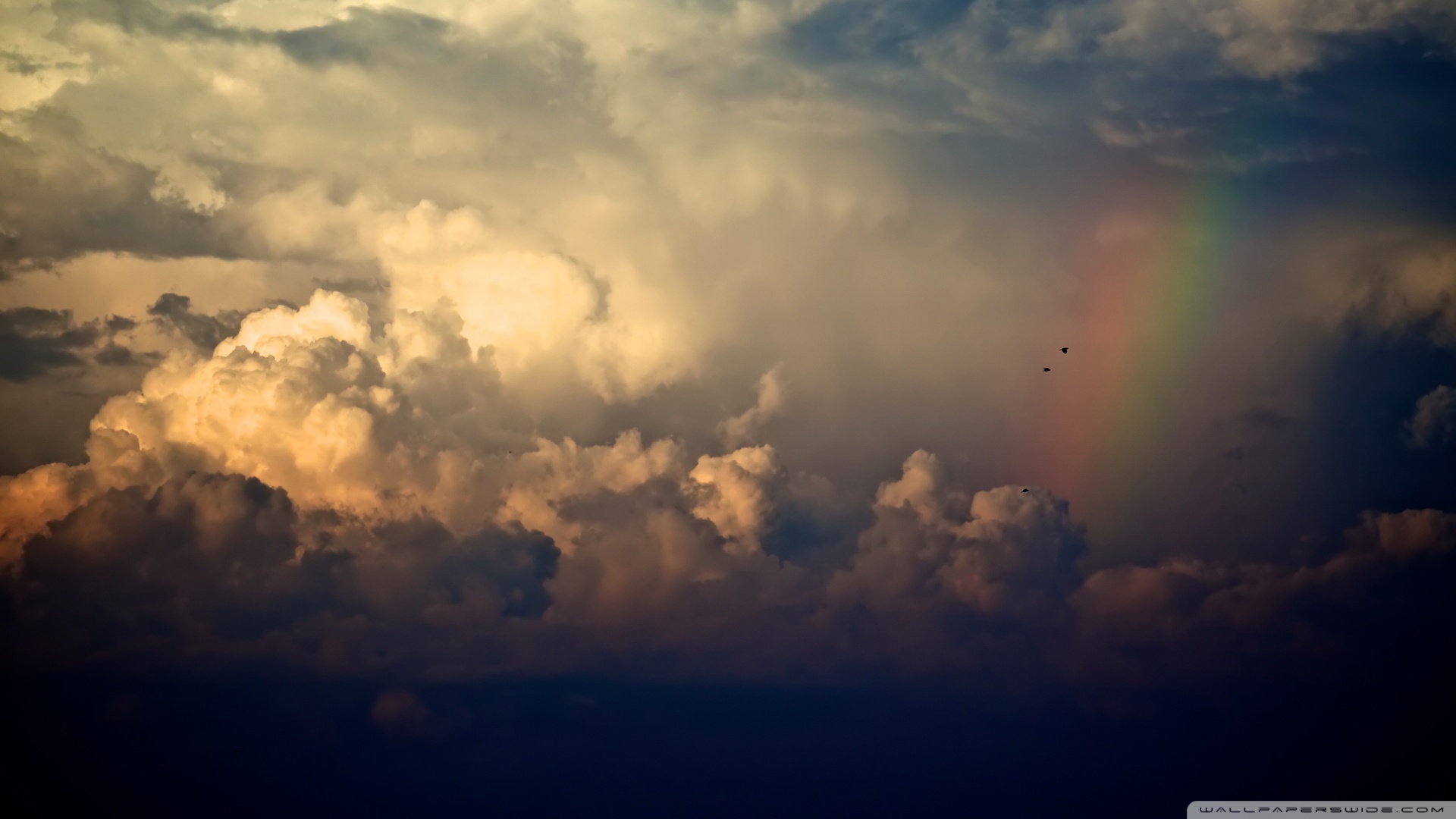 Storm Clouds And Rainbow Wallpaper