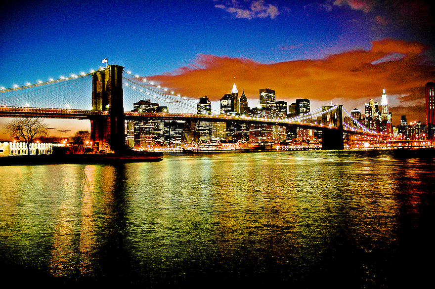 The Brooklyn Bridge At Sunset With Manhattan Skyline Seen From