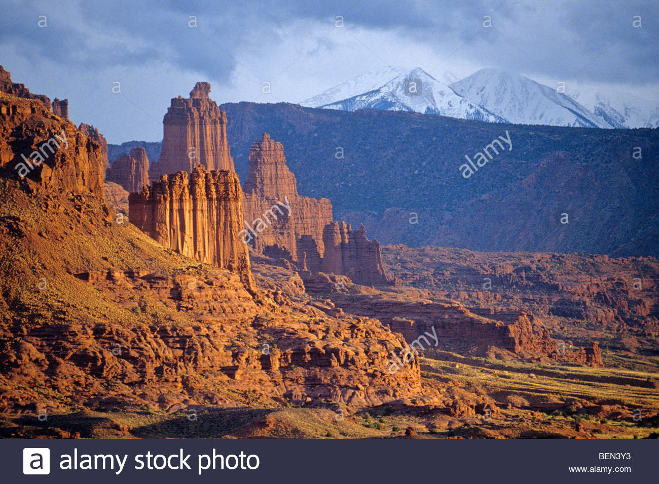 Fisher Towers At Sunset With Snowy La Sal Mountains In Background