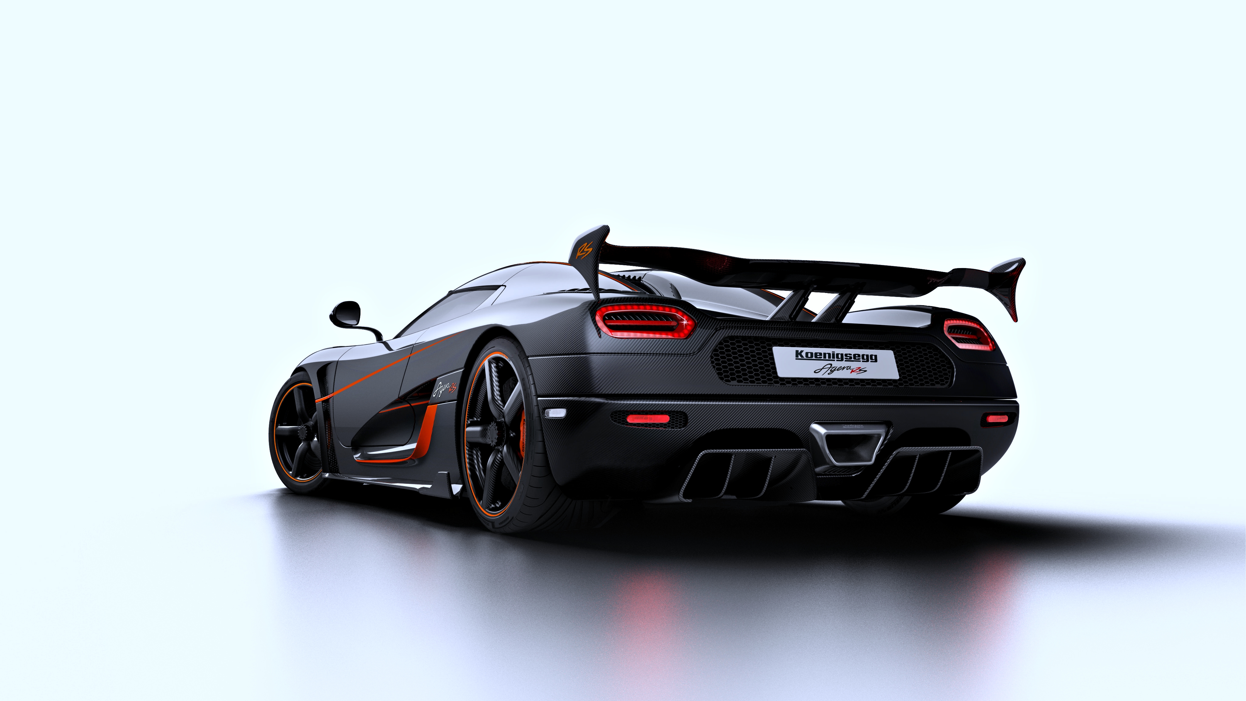Rear view of a black Koenigsegg Agera sports car on a white background