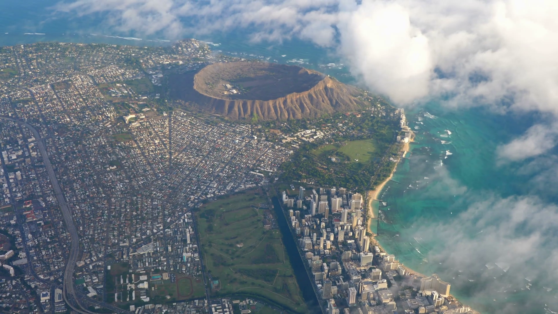Aerial shot above Diamond Head and Waikiki beach at Oahu Hawaii in