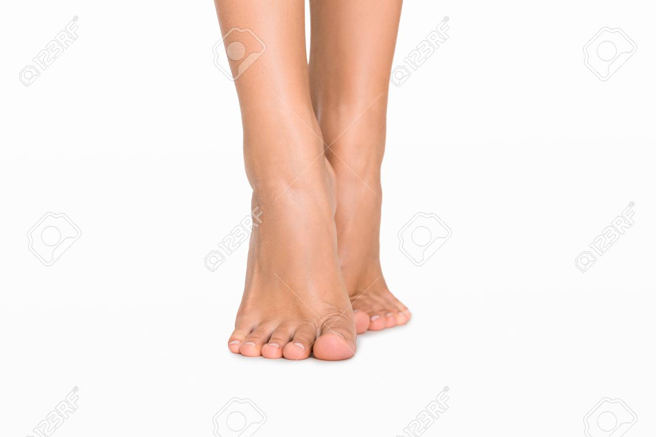 On Tiptoe Caucasian Womens Feet Isolated On White Background