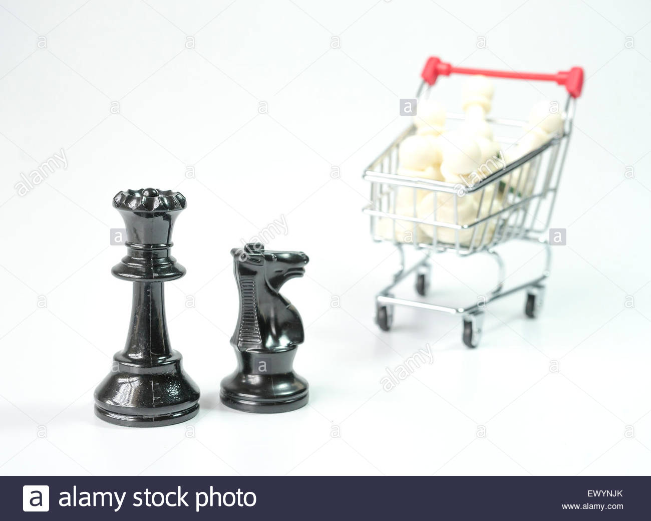Black Chess With White Pawn Inside Toy Trolley Background Stock