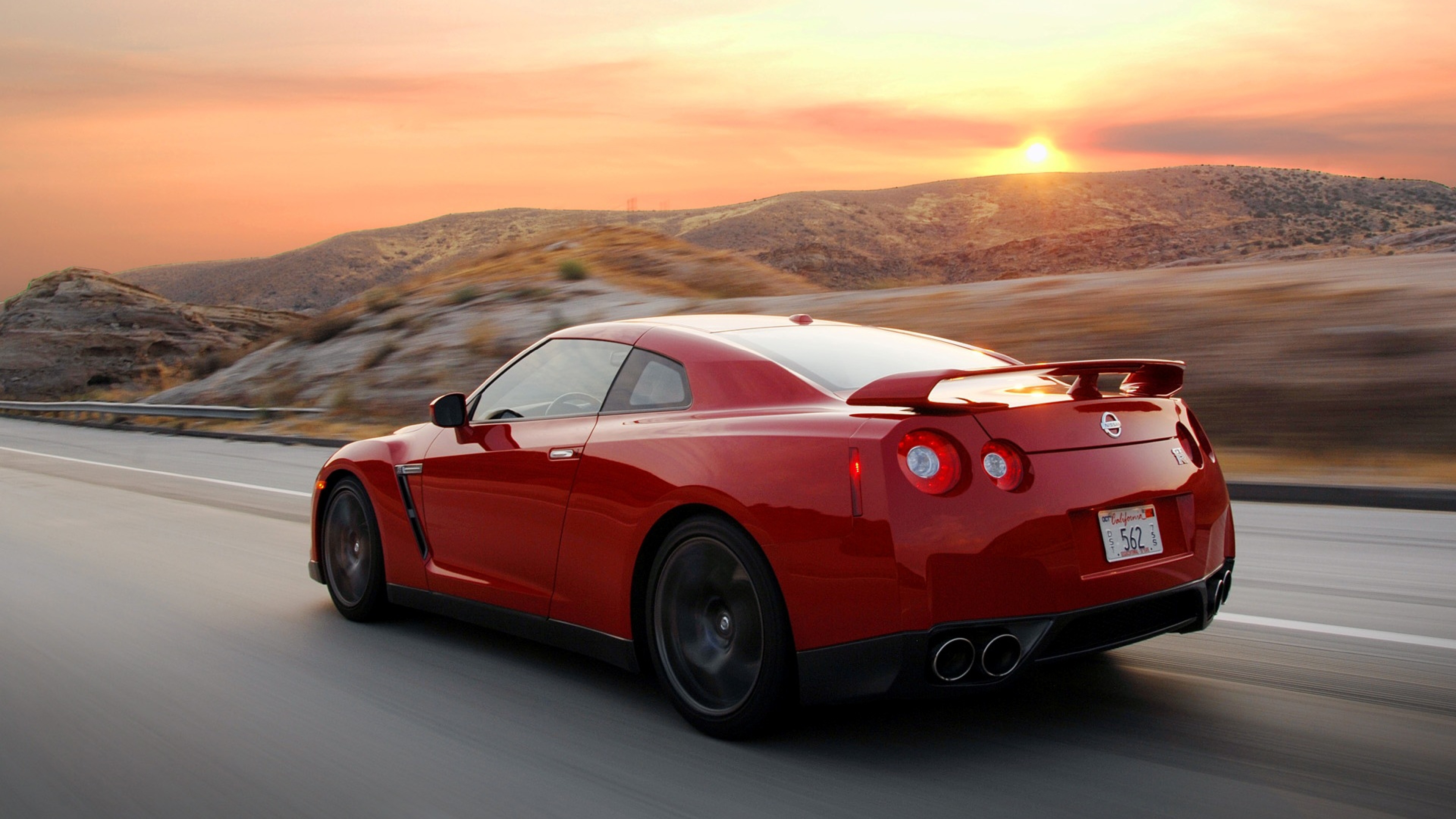 Nissan Red Run Moving Side Wallpaper Background 4k Ultra HD