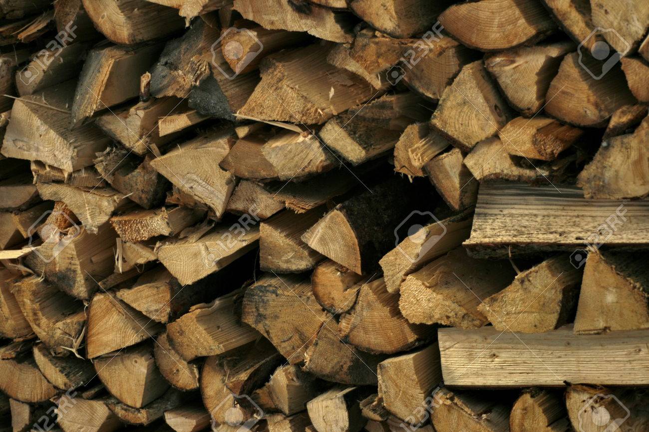 Free download Stacked Wood Logs Firewood As A Wallpaper Stock Photo